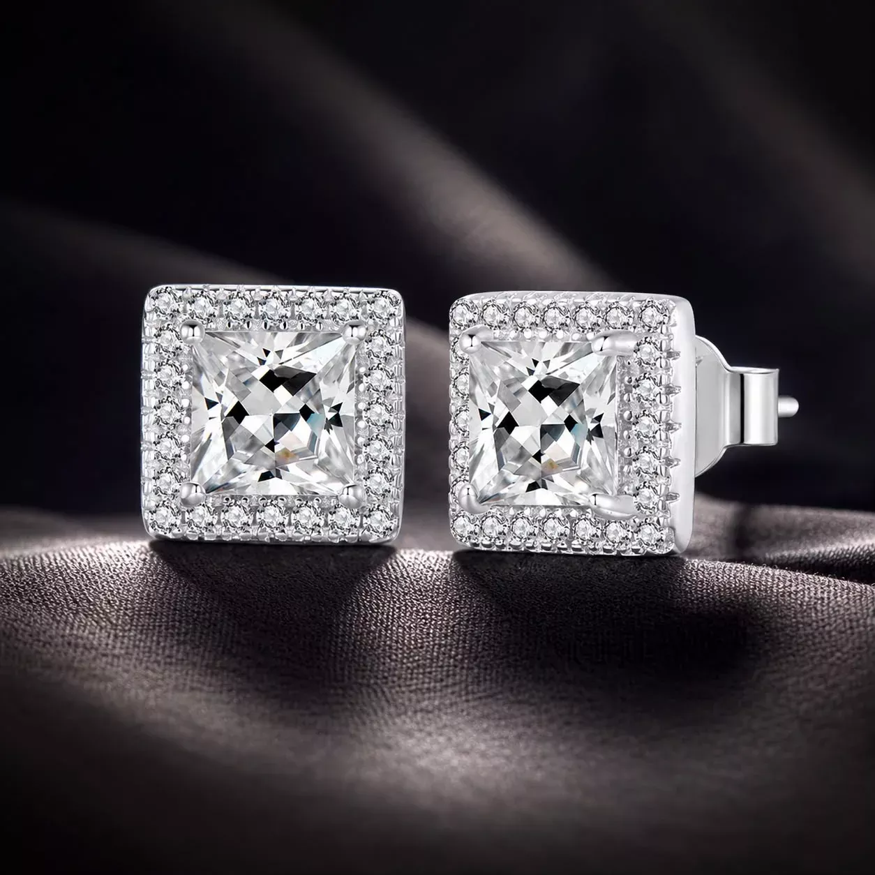 925 Sterling Silver Earrings with Pavé Setting CZ and Platinum Plating.